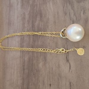 Skinny by Jessica Elliot goldtone faux pearl pendant necklace .